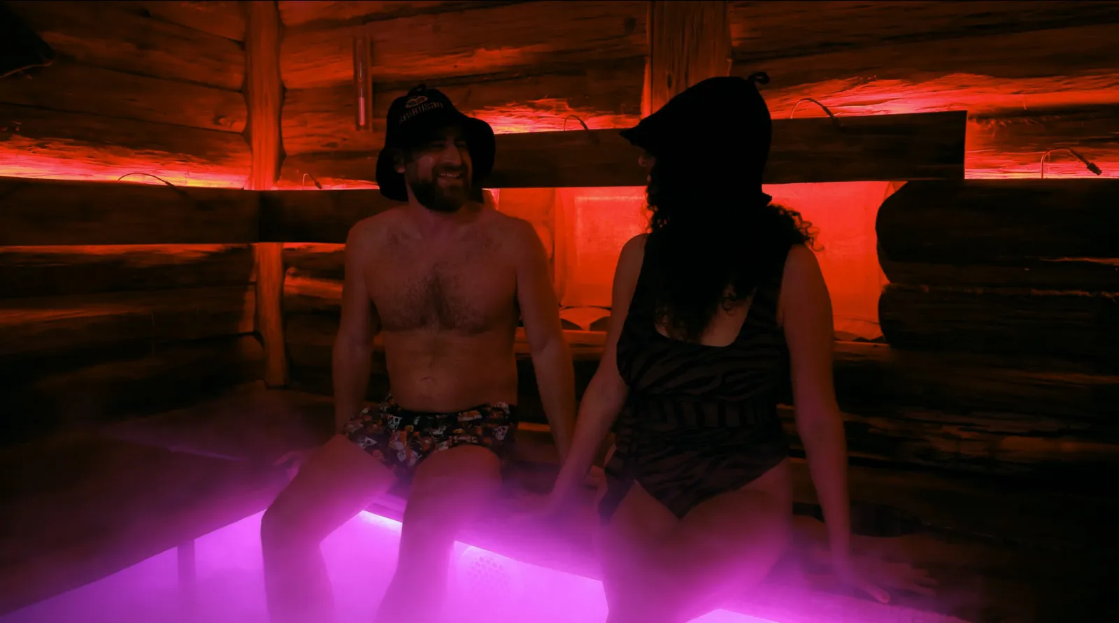 Guests inside the glowing steam room